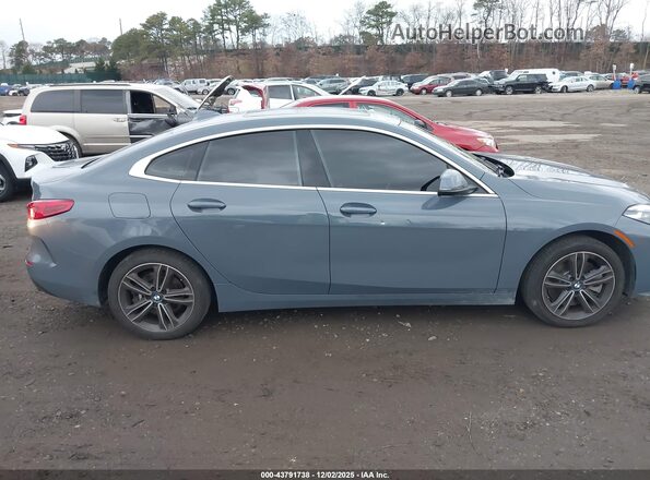WBA73AK09N7K37669 2022 BMW 2 SERIES Light Blue Vista interior trasera