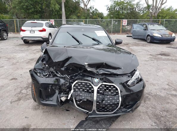 WBA73AV02PFN97418 2023 BMW 4 SERIES Black Widok z przodu