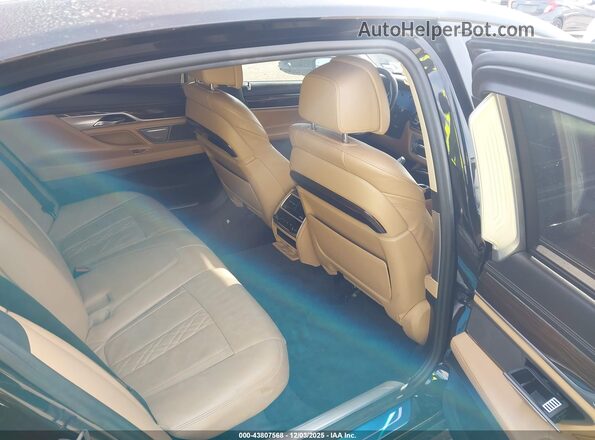 WBA7E2C35HG740869 2017 BMW 7 SERIES Black VIN կոդի պիտակի տեսք