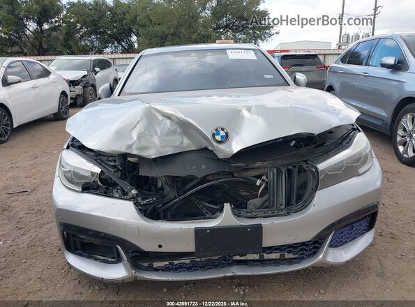 WBA7E2C38HG740560 2017 BMW 7 SERIES Silver ხელსაწყოთა პანელის ხედი