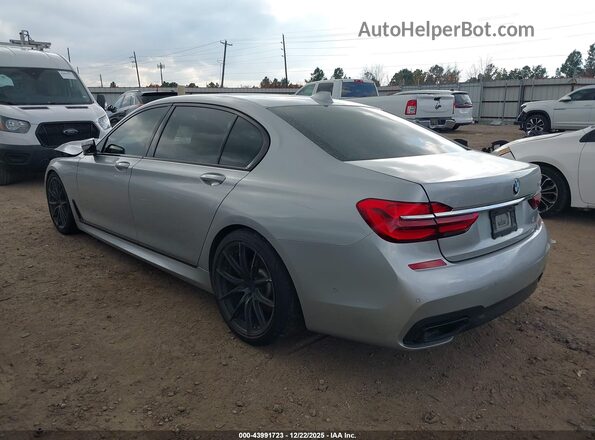 WBA7E2C38HG740560 2017 BMW 7 SERIES Silver უკანა მარცხენა