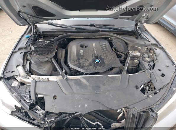 WBA7E2C38HG740560 2017 BMW 7 SERIES Silver უკანა ხედი