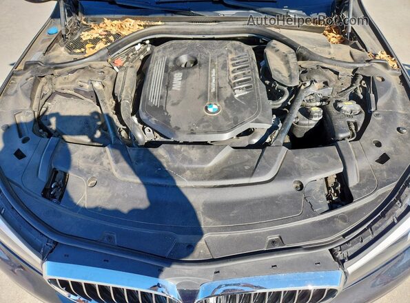 WBA7E2C51GG504638 2016 BMW 7 SERIES Blue Սալոնի հետևի տեսք
