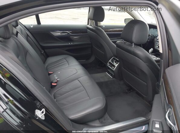 WBA7E2C51KB216544 2019 BMW 7 SERIES Black Vista de la etiqueta del VIN