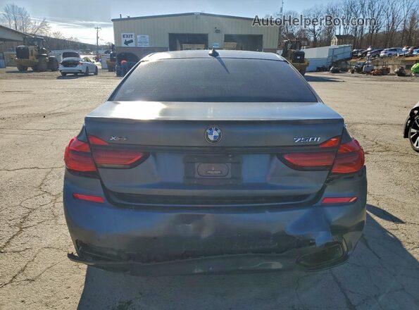 WBA7F2C57JG424586 2018 BMW 7 SERIES Charcoal უკანა ხედი