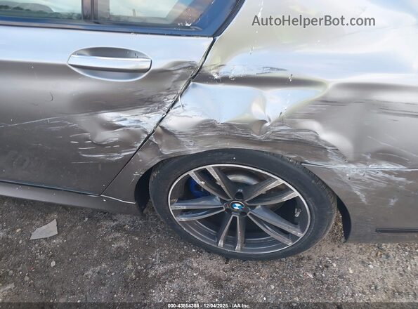 WBA7T4C08LCD35616 2020 BMW 7 SERIES Pewter Вид спереди