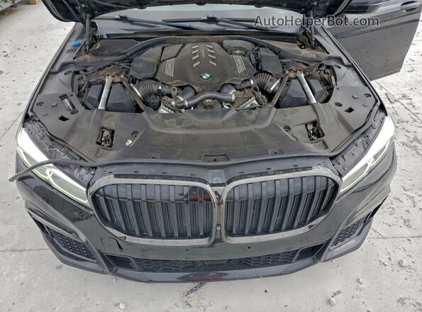 WBA7U2C01MCE61500 2021 BMW 7 SERIES Черный Вид задней части салона