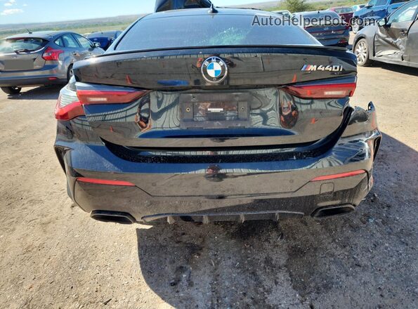 WBA83AP03NCK18085 2022 BMW M4 Black Vista trasera
