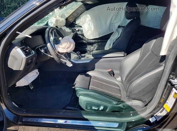 WBA83AP03NCK18085 2022 BMW M4 Black Vista interior delantera