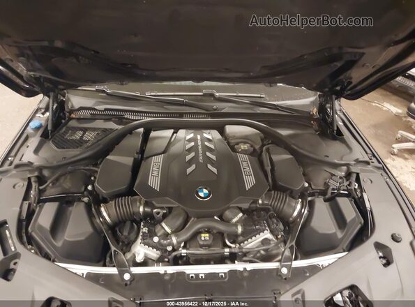 WBABC4C09NCH29316 2022 BMW M8 Blue Rear view