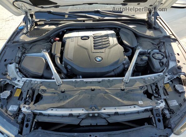 WBAGV2C04PCM45449 2023 BMW 8 SERIES White Սալոնի հետևի տեսք
