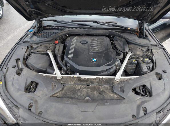 WBAGV4C09MCE95094 2021 BMW 8 SERIES Black უკანა ხედი