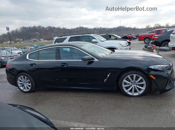 WBAGV4C09MCE95094 2021 BMW 8 SERIES Black უკანა სალონის ხედი