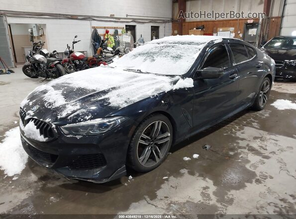 WBAGV4C09MCF63717 2021 BMW 8 SERIES Синий Передняя левая четверть