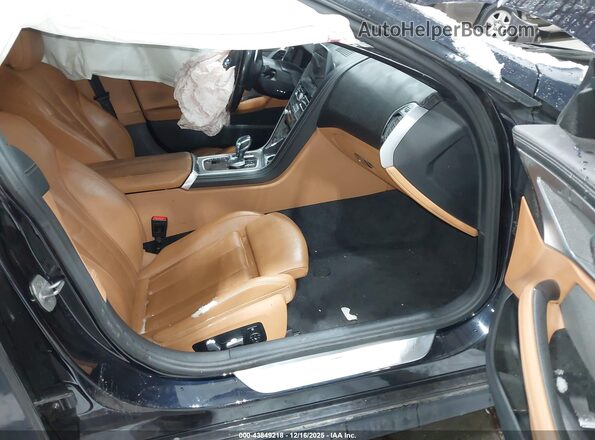 WBAGV4C09MCF63717 2021 BMW 8 SERIES Синий Вид салона спереди