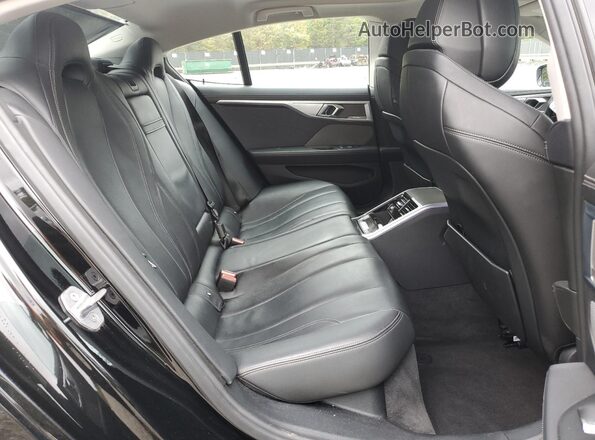 WBAGV4C0XLCE24310 2020 BMW 8 SERIES Black Vista de los asientos traseros