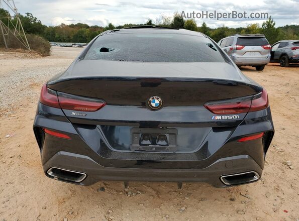 WBAGV8C01NCH51236 2022 BMW M8 Blue Rear view