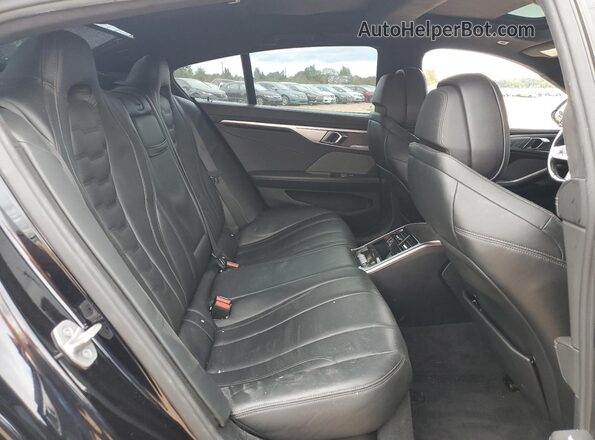 WBAGV8C01NCH51236 2022 BMW M8 Blue Rear seats view