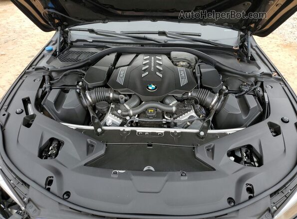 WBAGV8C01NCH51236 2022 BMW M8 Blue Rear interior view