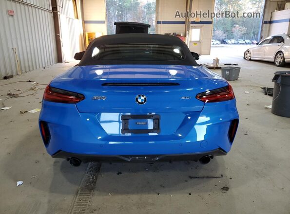 WBAHF3C5XKWW43995 2019 BMW Z4 Blue Вид ззаду
