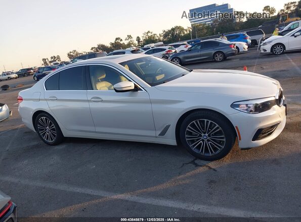WBAJA9C01LCD41525 2020 BMW 5 SERIES White Vista interior trasera