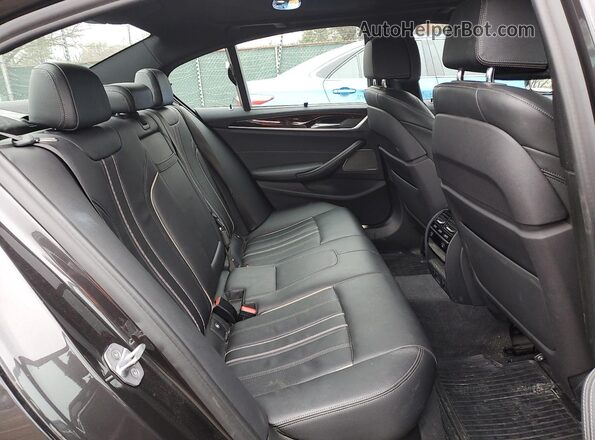 WBAJB9C58JB035401 2018 BMW M5 Charcoal Vista de los asientos traseros