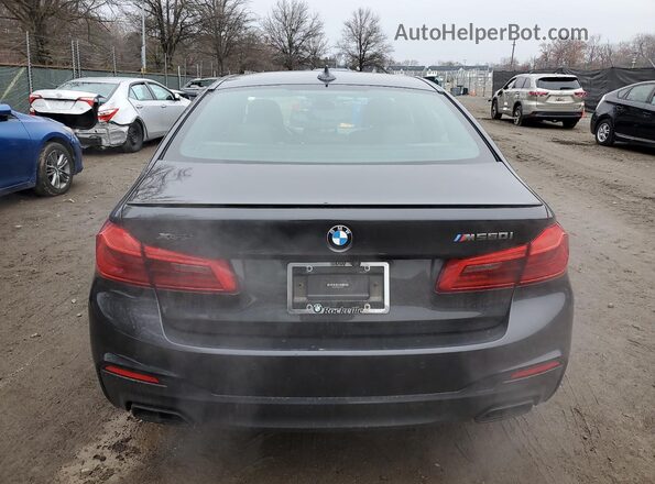 WBAJB9C58JB035401 2018 BMW M5 Charcoal Vista trasera