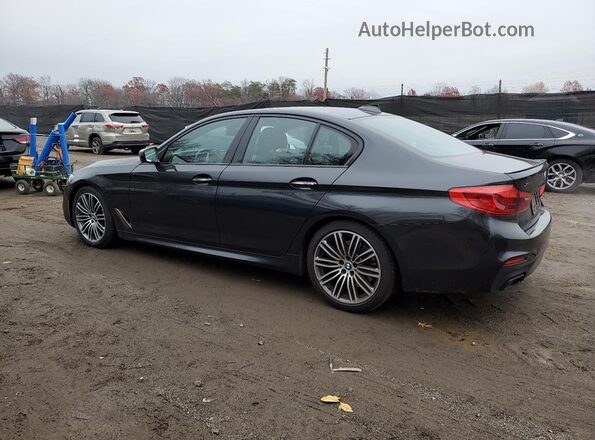 WBAJB9C58JB035401 2018 BMW M5 Charcoal Trasero izquierdo