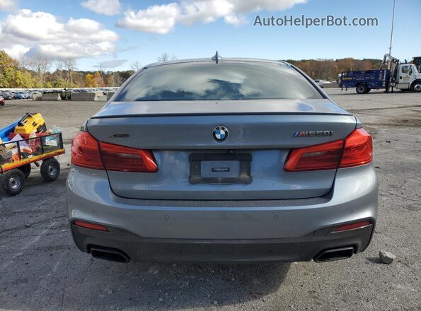 WBAJB9C58KB464877 2019 BMW M5 Silver Հետևի տեսք