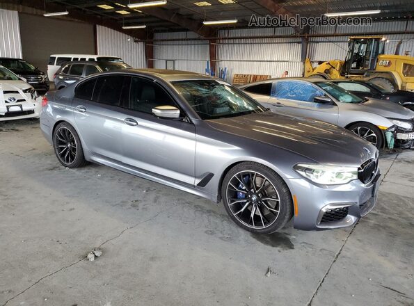WBAJB9C5XKB288432 2019 BMW M5 Серый Передняя правая четверть