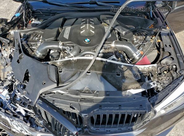 WBAJS7C03LCE13617 2020 BMW M5 Gray Vista interior trasera