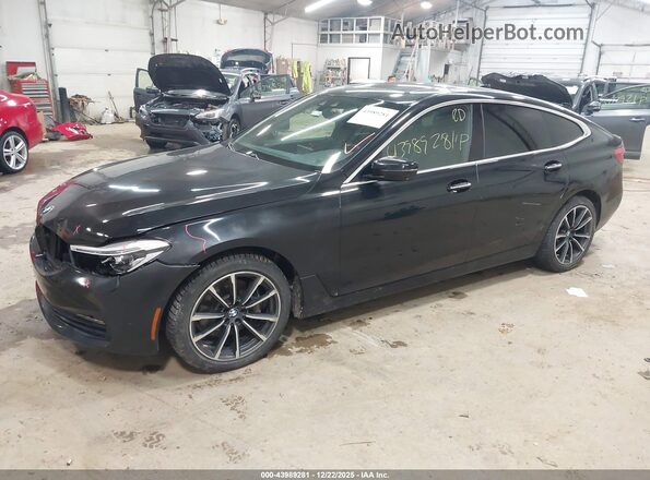 WBAJV6C54JBK07509 2018 BMW 6 SERIES Black Vista tres cuartos delantera izquierda