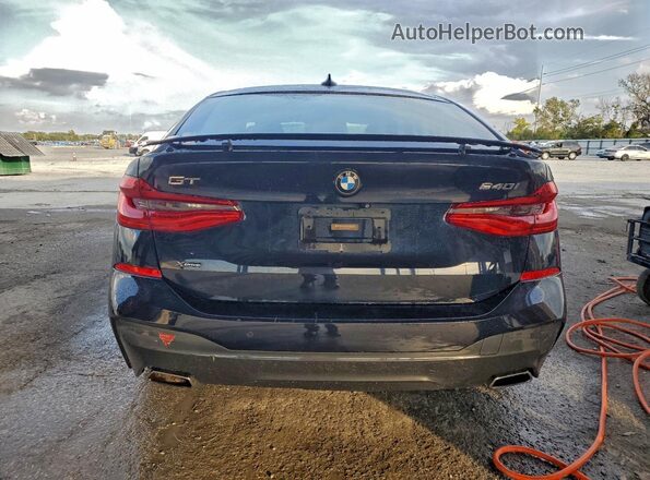 WBAJV6C58JBJ99401 2018 BMW 6 SERIES Black Rear view