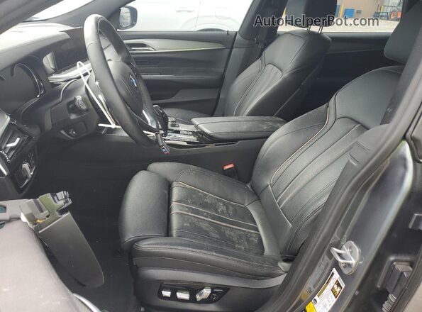 WBAJV6C59JBK07733 2018 BMW 6 SERIES Blue Vista interior delantera