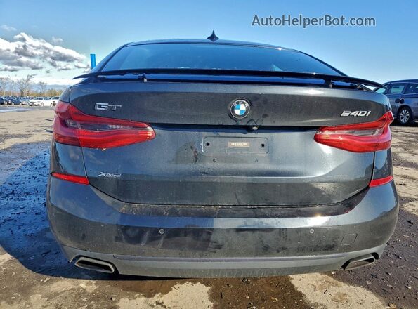 WBAJV6C5XJBJ99366 2018 BMW 6 SERIES Black Rear view