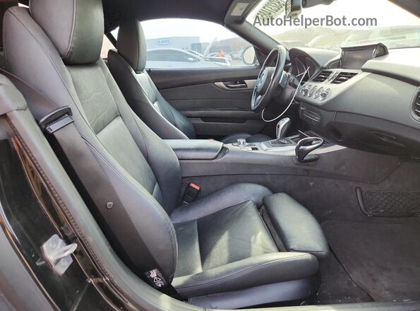 WBALM7C5XGJ799353 2016 BMW Z4 Black Vista de los asientos traseros