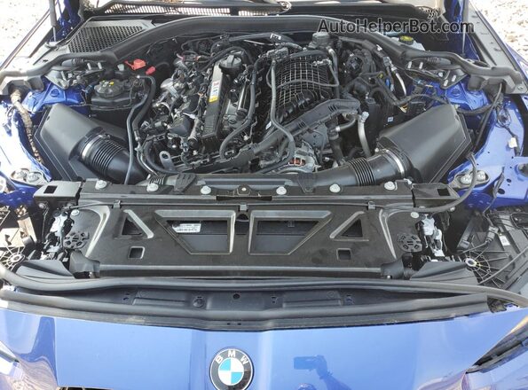 WBS43AZ04RCP54170 2024 BMW M4 Blue Սալոնի հետևի տեսք