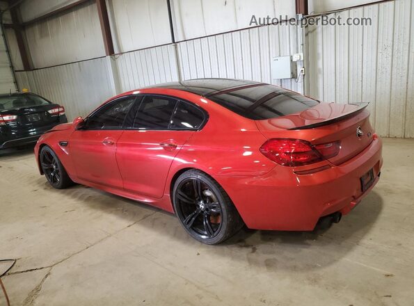 WBS6E9C50GG437272 2016 BMW M6 Оранжевый Задняя левая четверть