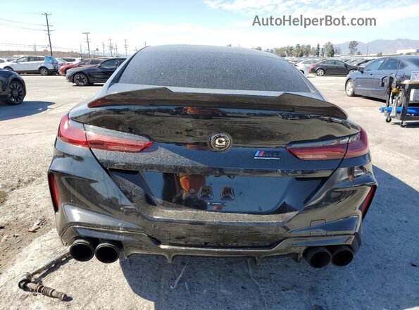 WBSGV0C09RCN76816 2024 BMW M8 Black Vista trasera
