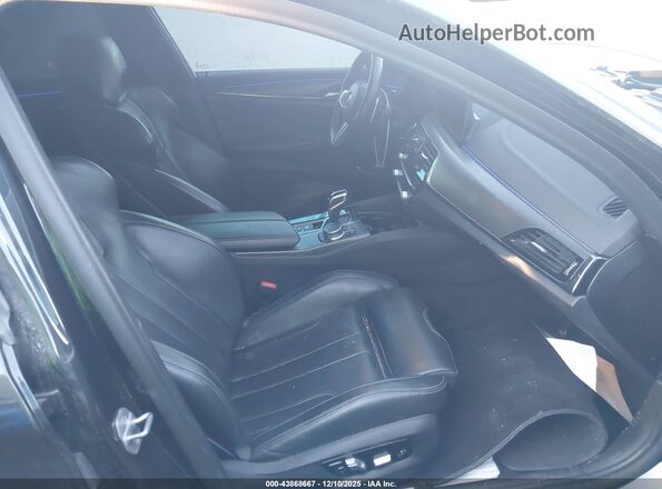 WBSJF0C09LCE34074 2020 BMW M5 Черный Вид салона спереди