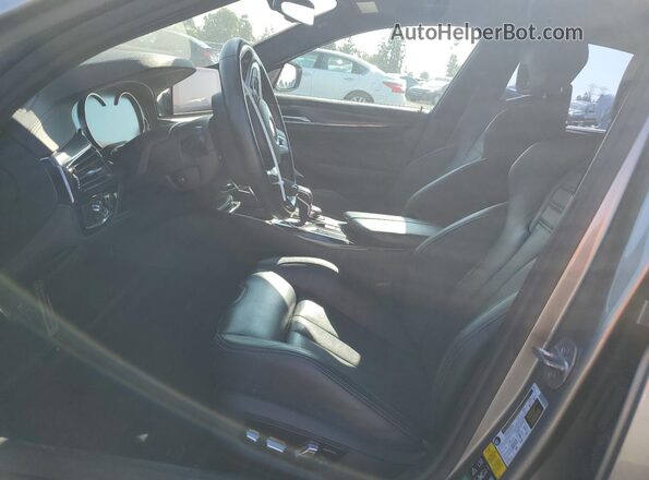 WBSJF0C57KB284589 2019 BMW M5 Серебряный Вид салона спереди