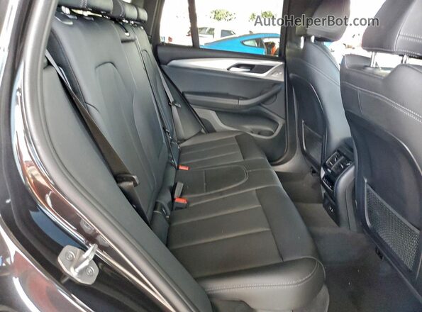WBX47DP08RN280537 2024 BMW X3 Gray Rear interior view