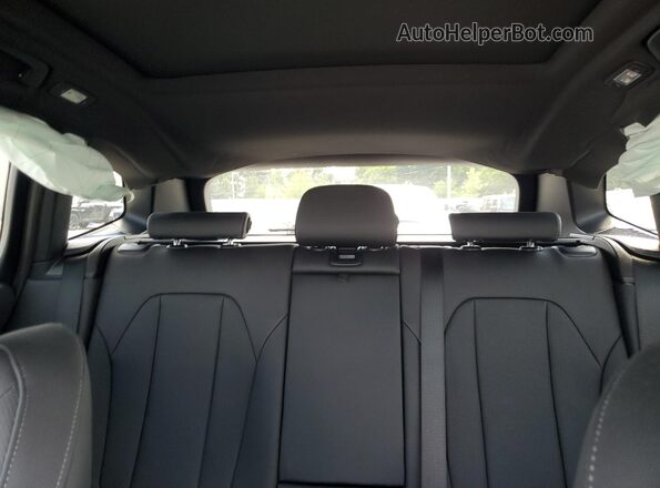 WBX57DP09RN297643 2024 BMW X3 Black Rear seats view