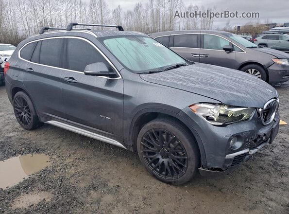 WBXHT3C37H5F74147 2017 BMW X1 Gray Передня права чверть