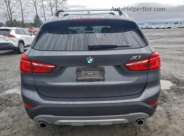 WBXHT3C37H5F74147 2017 BMW X1 Gray Вид ззаду