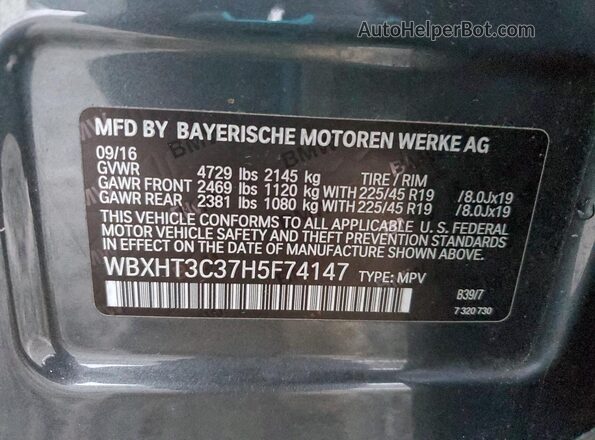 WBXHT3C37H5F74147 2017 BMW X1 Gray Вид наклейки з VIN-кодом