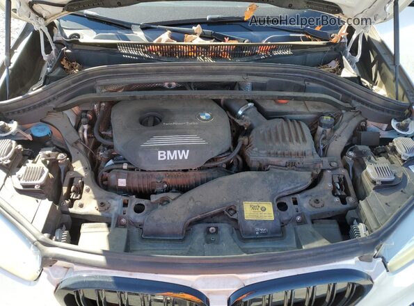 WBXHT3C39GP888575 2016 BMW X1 White Engine compartment view