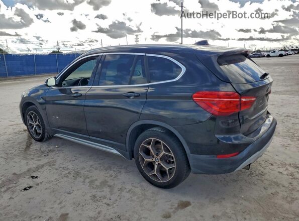 WBXHT3C39J5K24876 2018 BMW X1 Blue 