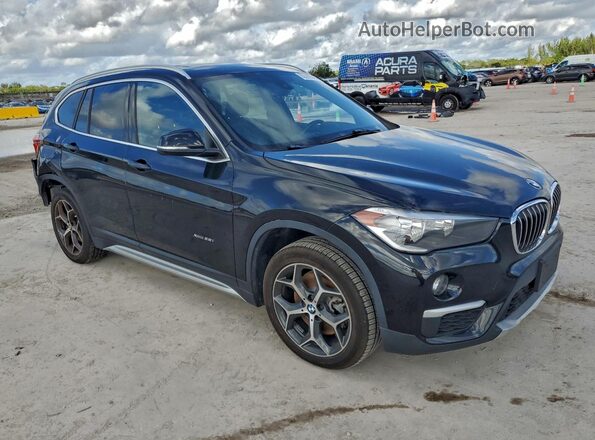WBXHT3C39J5K24876 2018 BMW X1 Blue 