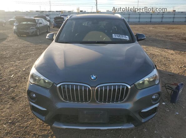WBXHT3C51K5L38437 2019 BMW X1 Gray Դիմացի տեսք